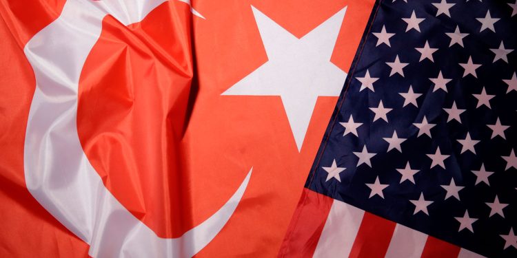 Turkey and U.S. flags are seen in this picture illustration taken August 25, 2018. Picture taken August 25, 2018. REUTERS/Dado Ruvic/Illustration - RC1394312EF0